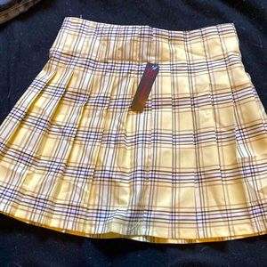 Yellow plaid skirt.